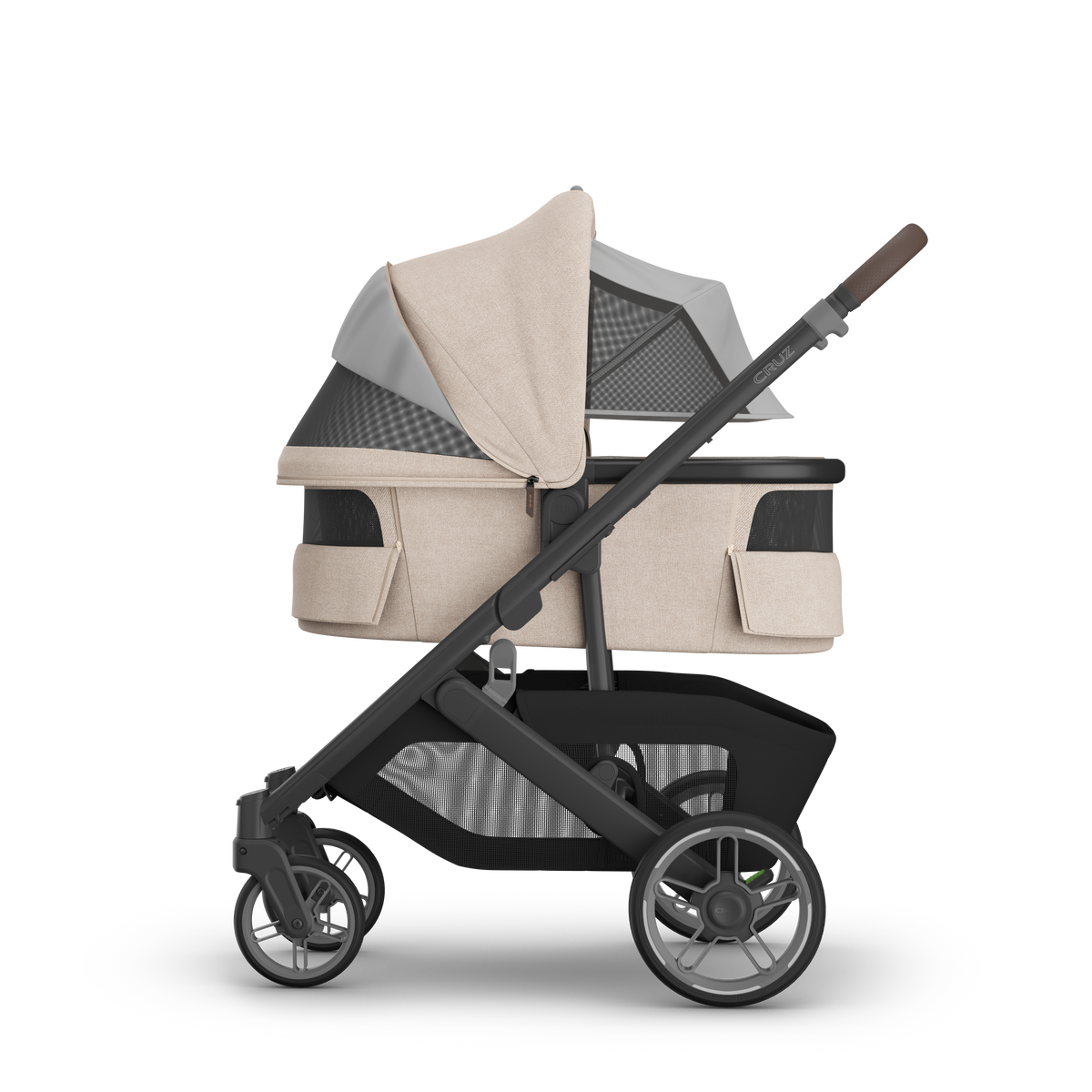 UPPAbaby V3 Bassinet - Liam (Oat Melange / Carbon), on Cruz V3, side, all vents open