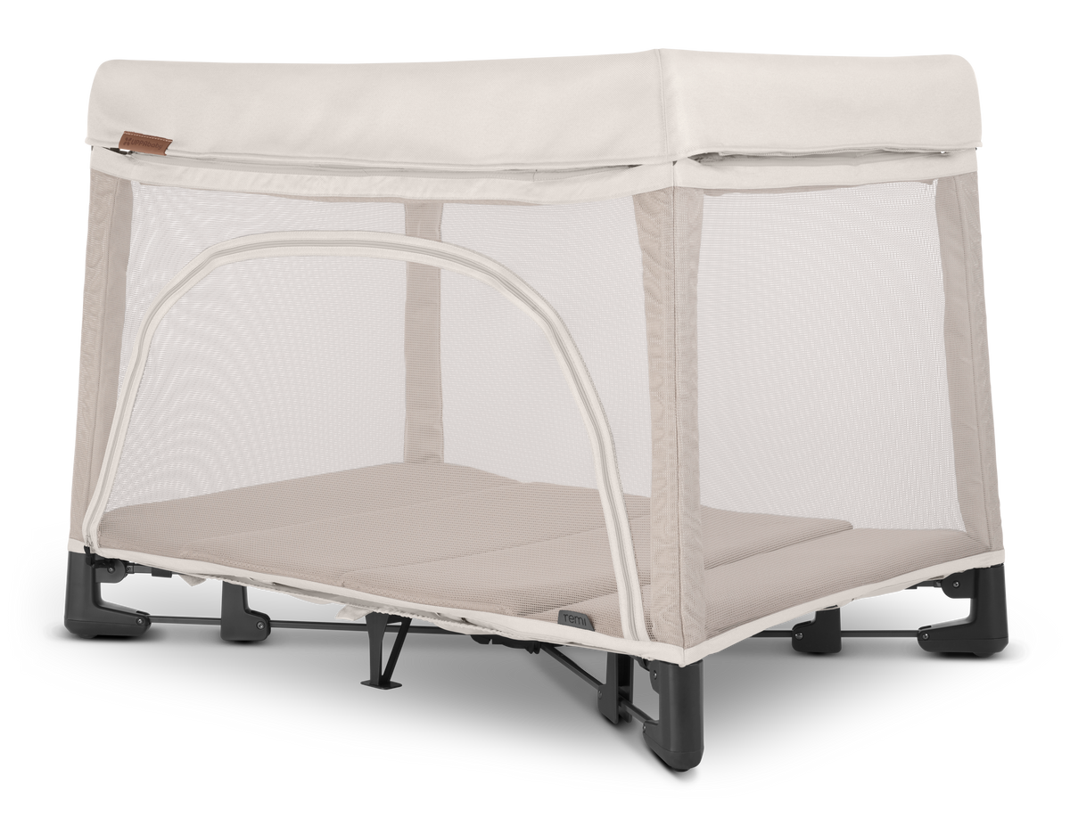 UPPAbaby Remi Portacot - Charlie (Sand Melange), three quarter left