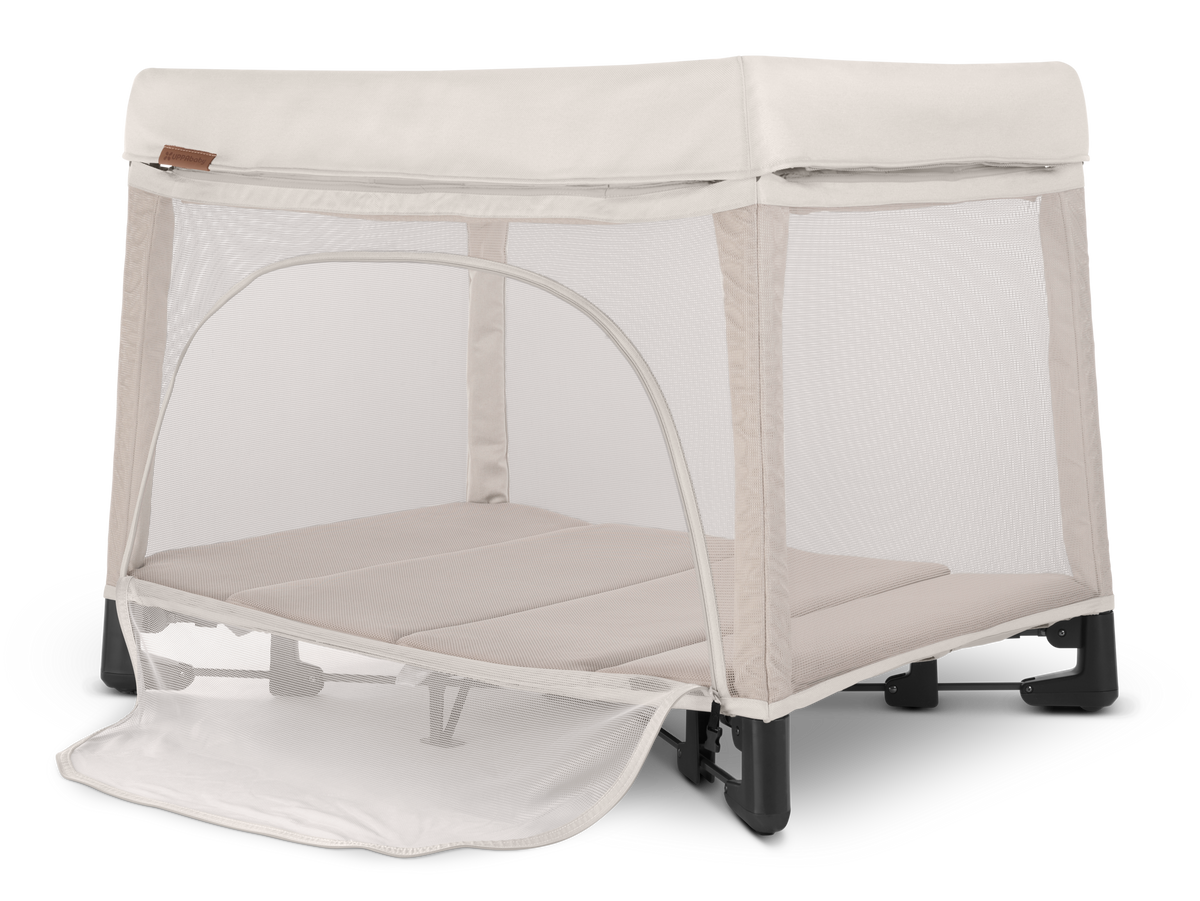 UPPAbaby Remi Portacot - Charlie (Sand Melange), three quarter left panel open