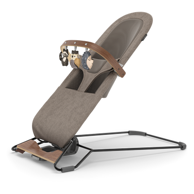 UPPAbaby Mira Baby Bouncer Forest Fun Toy Bar (Grey / Walnut Wood), three quarter left