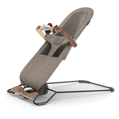 UPPAbaby Mira Baby Bouncer Wonder Wheel Toy Bar (Multicolor / Walnut Wood), three quarter left