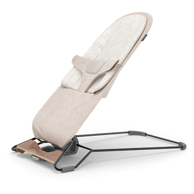 UPPAbaby Mira Baby Bouncer - Charlie (Sand Melange / Black Chrome / Walnut Wood), three quarter left insert