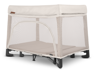 UPPAbaby Remi Portacot - Charlie (Sand Melange), three quarter left
