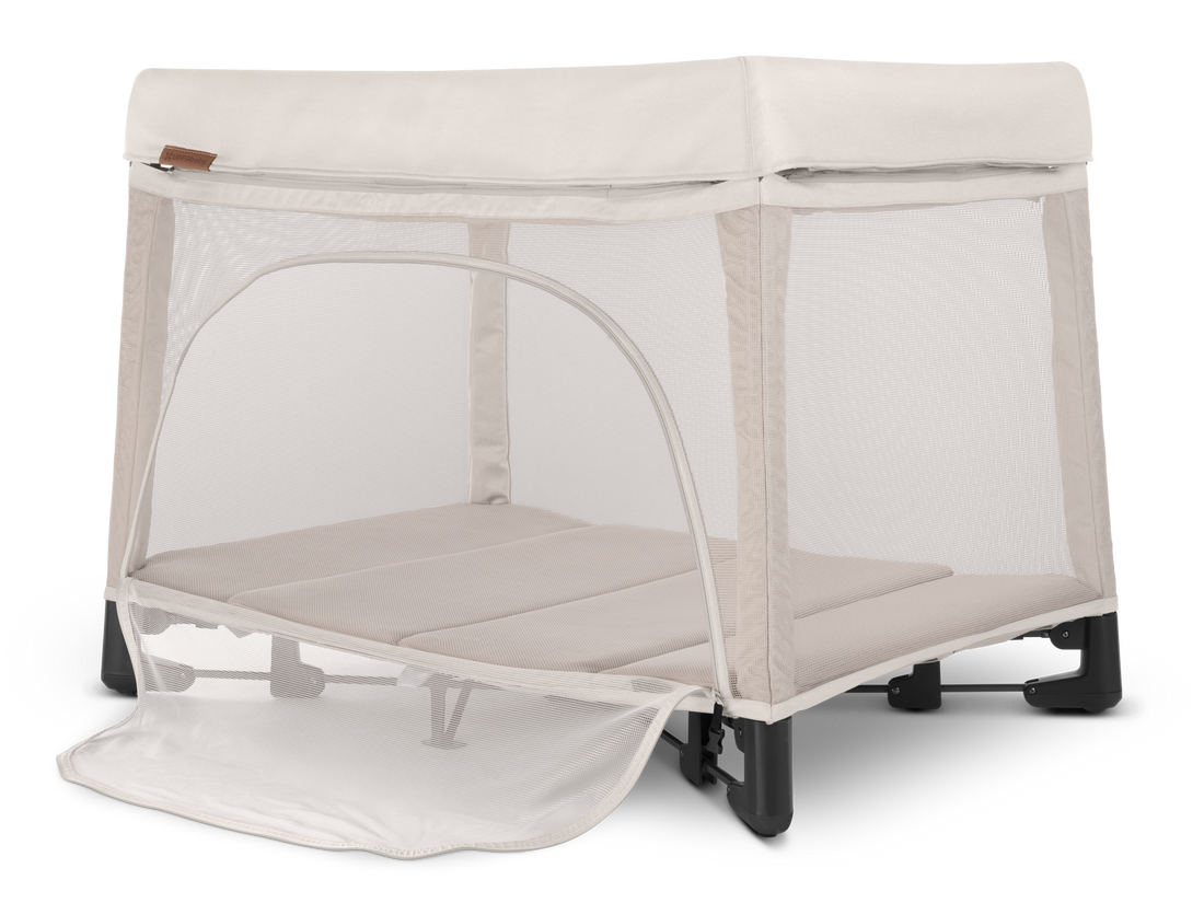 UPPAbaby Remi Portacot - Charlie (Sand Melange), three quarter left panel open