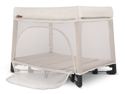 UPPAbaby Remi Portacot - Charlie (Sand Melange), three quarter left panel open