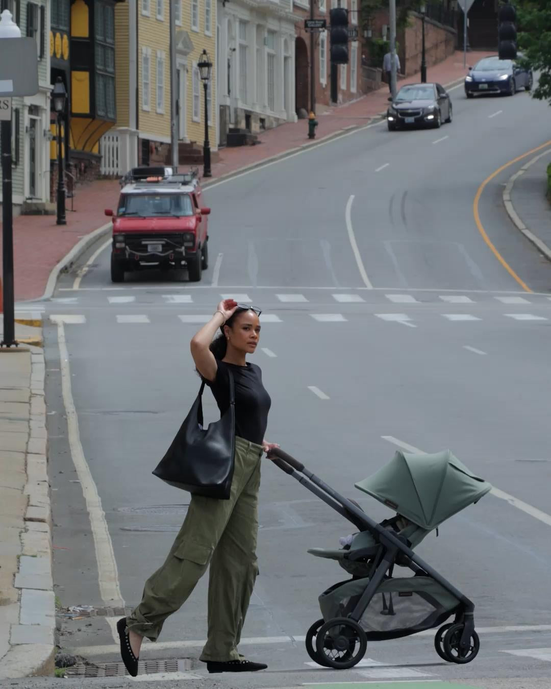 Kona in Evelyn crossing a street